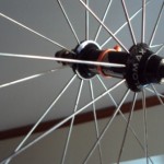 A couple pennies on zipties could help you hang onto that wheel-and make for faster pit stops. © Dave Drumm A couple pennies on zipties could help you hang onto that wheel-and make for faster pit stops. © Dave Drumm