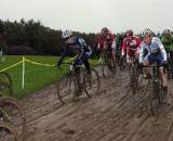 Elite men in 4 inches of thick mud on the first lap. © Paul Weiss
