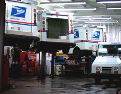 Is this why they’re taking so long? USPS trucks being repaired. by flickr user: spatulated