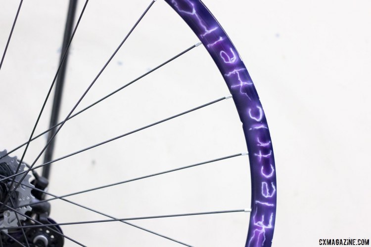 With Electric Hell on the rim, along with the purple and electric white paintjob, the bike appears to pay homage to an English Metal band called Possessor, making this bike a clear cousin to Noren’s famous Evil Dead 2 track bike. © Cyclocross Magazine