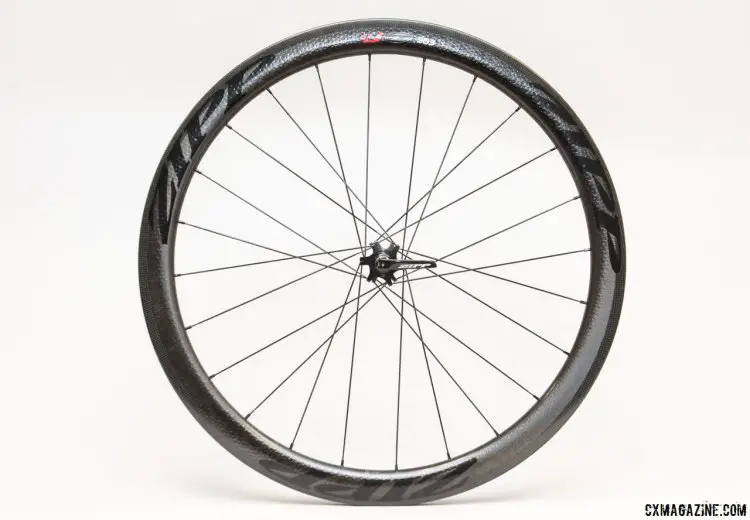The new Zipp 303 disc wheel comes in black or white graphics, and the new hubset saves 35g and $200 (tubular) or $450 (clincher) over the previous version. © Cyclocross Magazine