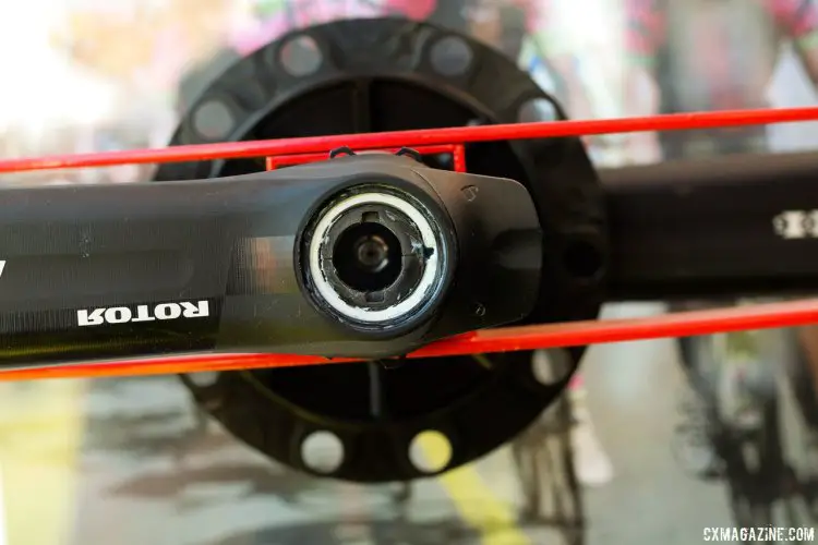Rotor's new INPower left crank axle-based power meter uses just one AA battery, inserted via a sealed cap in the left side of the bottom bracket axle. © Cyclocross Magazine