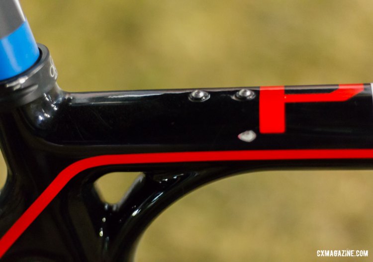 Two small bolts mark the spot where external cable guides can be run for mechanical shifting or on the cantilever brake version of the Colnago Cross Prestige. © Cyclocross Magazine