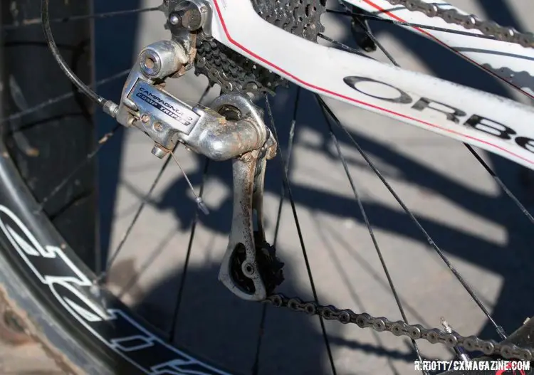 A long-cage Campagnolo Comp Triple 10-speed derailleur handles the shifting. © Cyclocross Magazine