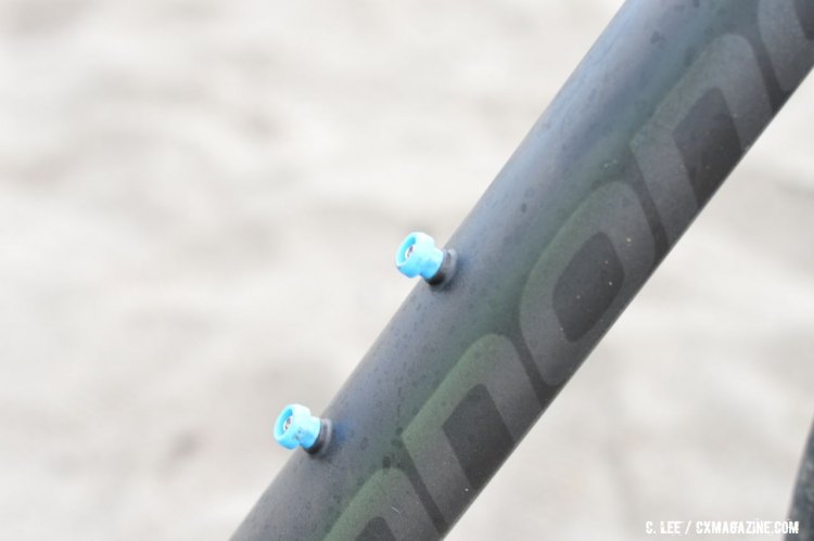 The bottle slid onto these extended nylon-topped bolts. © Clifford Lee / Cyclocross Magazine