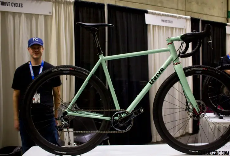 Darrel Williams of Thrive Cycles has been building for a year and a half, and stands proudly next to his brazed steel cyclocross/gravel bike. NAHBS 2016. © Cyclocross Magazine