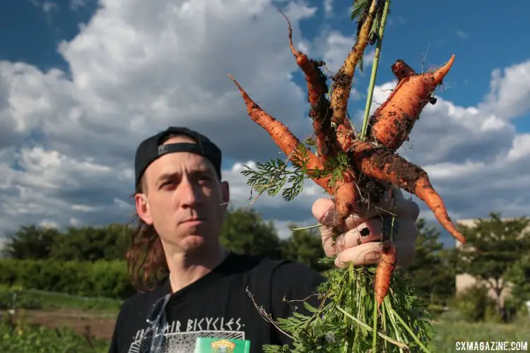 Travis from Fresh Air Bicycles grabs some fresh carrots at the Sierra Nevada brewery garden. © Cyclocross Magazine