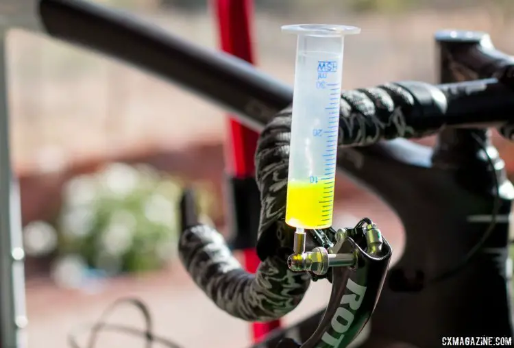 The Uno hydraulic shifting component group from Rotor uses a 30% glycol solution, which is basically antifreeze. Rotor will sell their own fluid, but acknowledged auto antifreeze of the same proportions would work. © Cyclocross Magazine