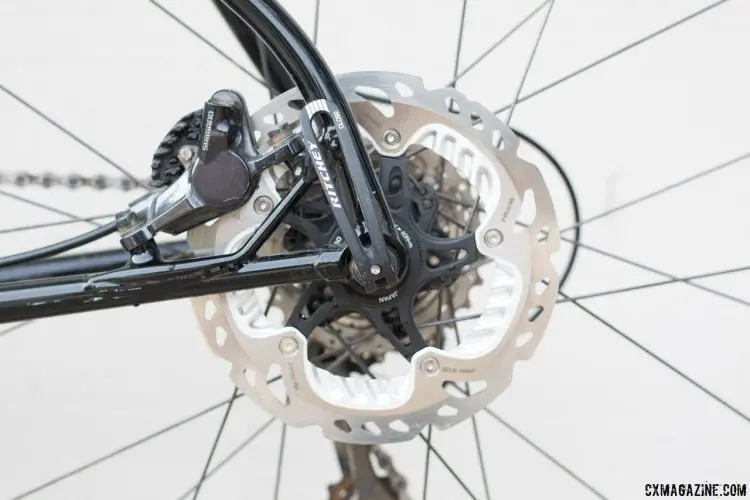 The rear brake caliper is flat mounted and the rear end has a cross brace to handle the increased brake torque. © Cyclocross Magazine