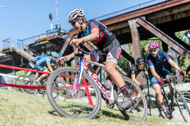 Riders rail a corner in the shadow of a train bridge. 2017 West Sacramento GP (Saturday). © J. Vander Stucken / Cyclocross Magazine