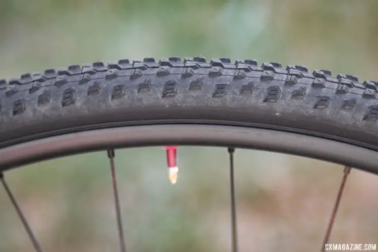 Unlike tubulars, Fahringer's Maxxis tubeless tires can be swapped in minutes should she flat or see a change in conditions. Rebecca Fahringer's Scott Addict CX with tubeless Maxxis tires. © Cyclocross Magazine