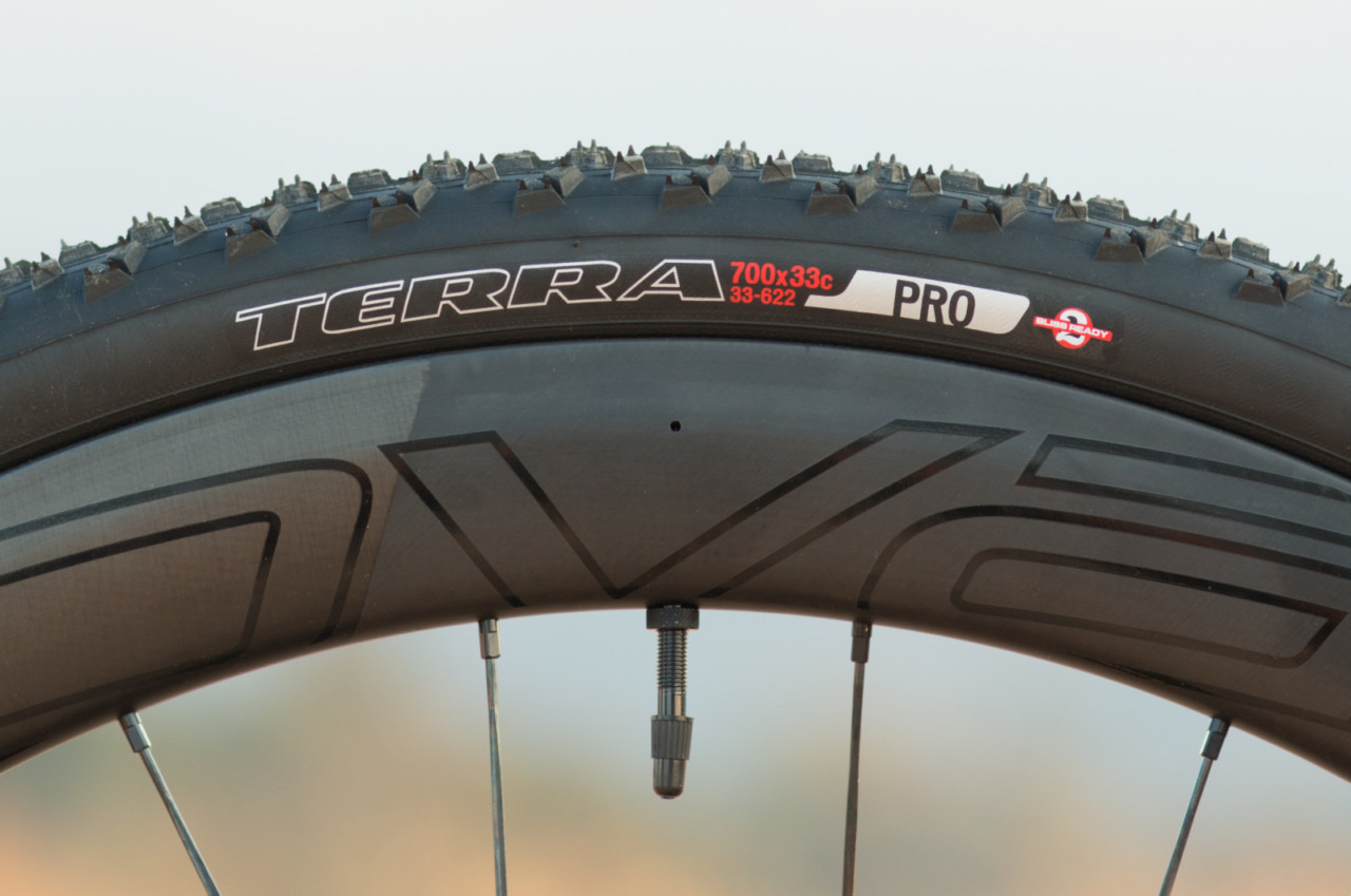 The 2018 Specialized S-Works CruX cyclocross bike comes with $2400 Roval CLX 50 1415g (list) carbon wheels and the company's first-generation Terra tubeless tires. Both are capable products, but for the ultimate in low-pressure tubeless reliability, we'd opt for a different internal rim profile. Perhaps trade them for the Roval Control SL 29 hoops, which are 95g lighter and $500 cheaper (but you'll need 12mm front hub caps). © Cyclocross Magazine