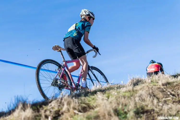 A junior surveys his competition on top of a short climb. 2017 Surf City Cyclocross, Calfire Training Facility. © J. Vander Stucken