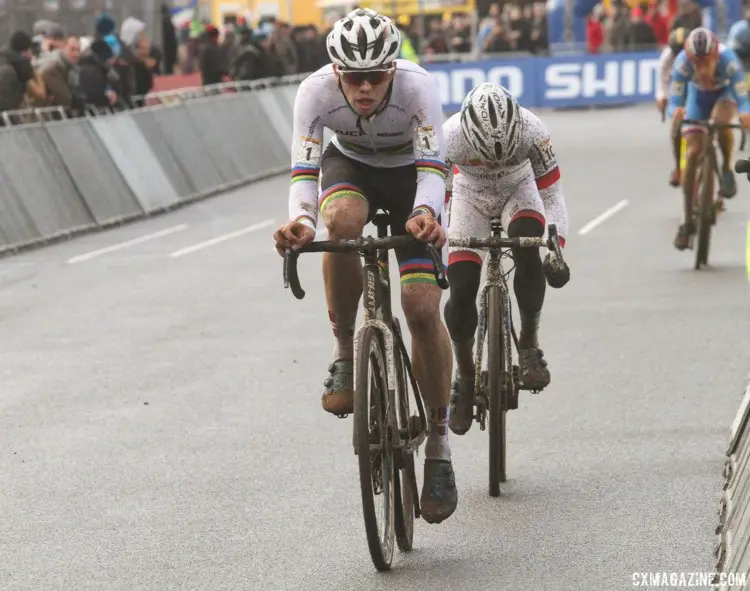 World Champion Joris Nieuwenhuis and European Champion Eli Iserbyt pull through the start/finish stretch. 2017 World Cup Zolder. © B. Hazen / Cyclocross Magazine