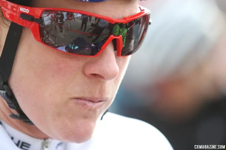 Katie Compton focuses at the start line while the media folks reflect in her glasses. 2018 Reno Cyclocross Nationals, Sunday. © D. Mable / Cyclocross Magazine