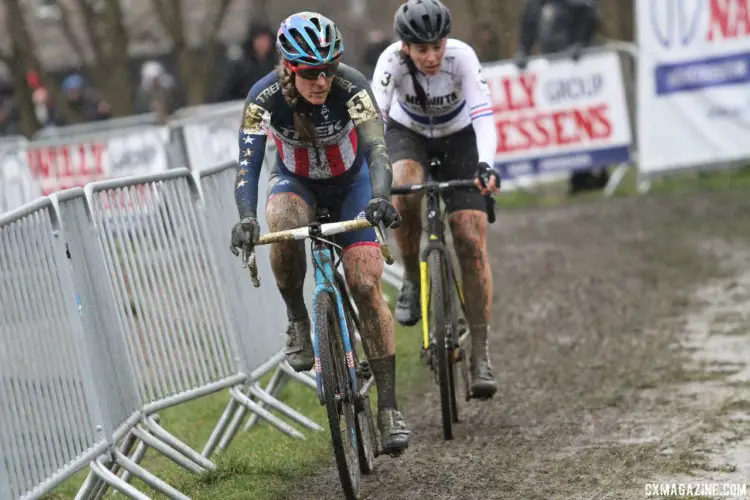 Katie Compton and Nikki Brammeier battle for position on the muddy course. 2018 GP Sven Nys Baal. © B. Hazen / Cyclocross Magazine