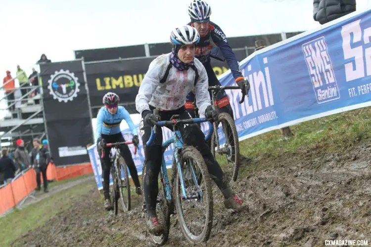 Courtenay McFadden focuses on the muddy off-camber ahead. 2018 Valkenburg Cyclocross World Championships - Thursday Practice. © B. Hazen / Cyclocross Magazine