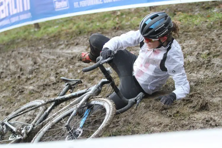 Emma Swartz shakes off a spill on the slick, muddy off-camber. 2018 Valkenburg Cyclocross World Championships - Thursday Practice. © B. Hazen / Cyclocross Magazine