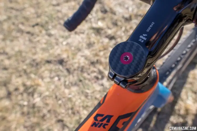 Lloyd's bike has a lot of weight saving touches, like this carbon headset cap and alloy bolt. Monica Lloyd's Masters 40-44 Title-winning KTM Canic cyclocross bike. 2018 Cyclocross National Championships. © A. Yee / Cyclocross Magazine