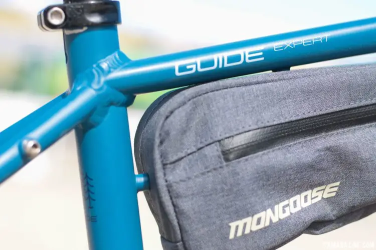 Mongoose added mounts to secure the included stash bag. Mongoose Guide Expert Gravel / Touring Bike. 2018 Sea Otter Classic. © Cyclocross Magazine