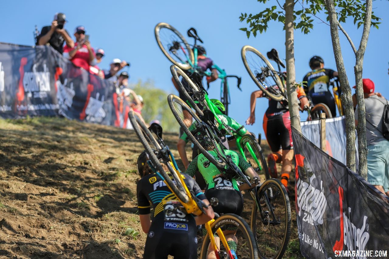 The women head up the run-up early in the first lap. 2018 World Cup Waterloo. © R. Clark / Cyclocross Magazine