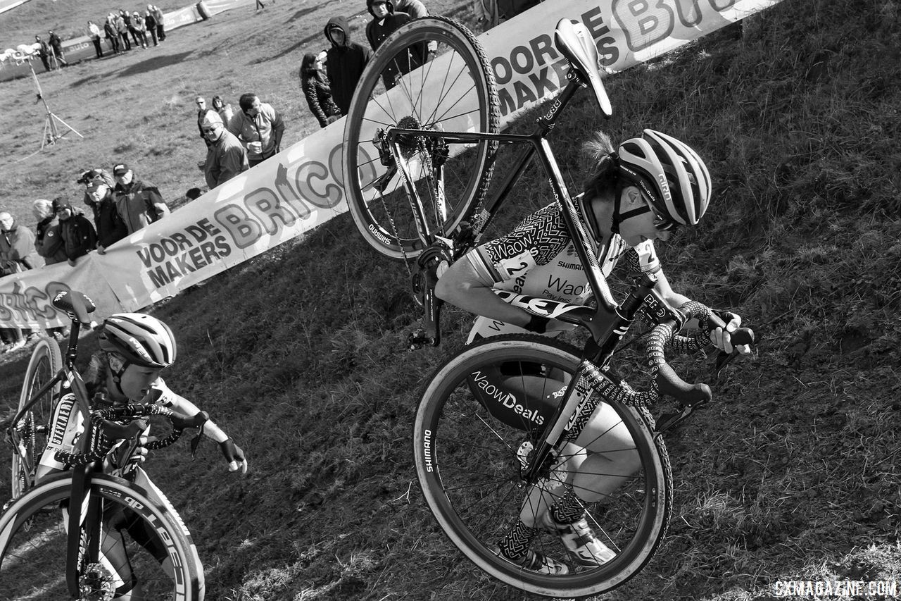 Marianne Vos and Annemarie Worst climb one of the ups on foot. 2018 Brico Cross Ronse / Hotondcross. © B. Hazen / Cyclocross Magazine