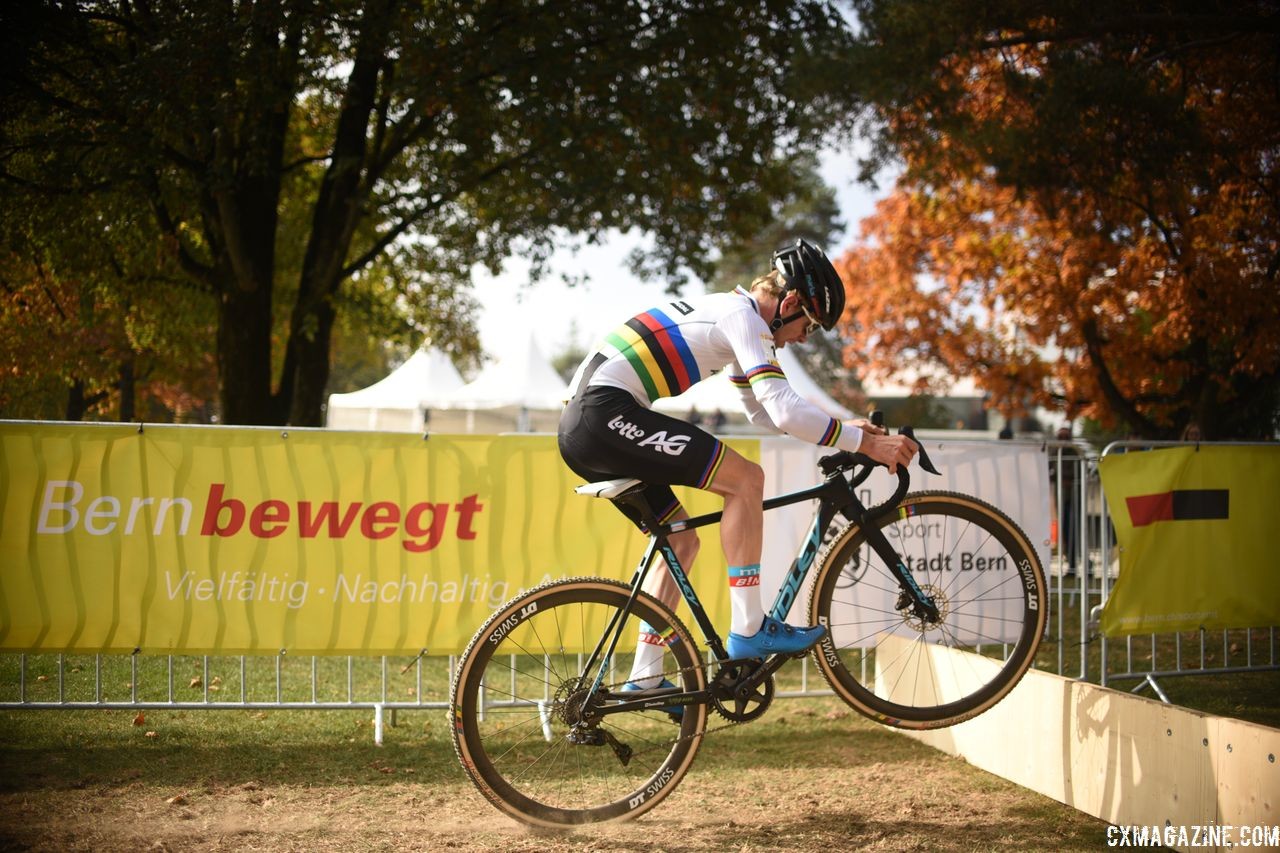 U23 World Champion Eli Iserbyt hops a barrier en route to winning the U23 race. 2018 World Cup Bern, Switzerland. © E. Haumesser / Cyclocross Magazine