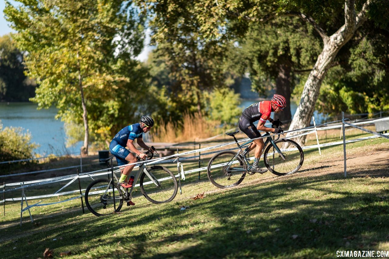 Cody Kaiser and Nathan Barton battle for 2nd in the Men's A race. 2018 Sacramento Cyclocross #2, Miller Park. © J. Vander Stucken / Cyclocross Magazine