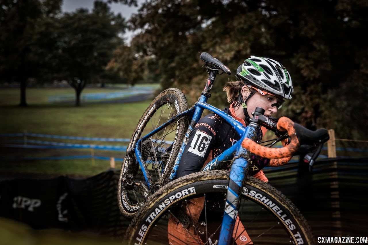 Jen Malik shoudlers her bike for a run-up. 2018 Cincinnati Cyclocross Day 1. © Greg Davis