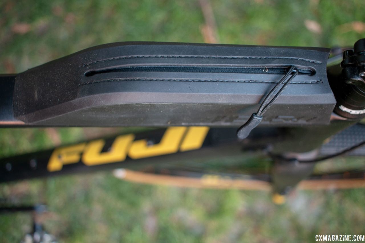 The included bento box has a zipper for security and mounts to threaded inserts on the top tube. 2019 Fuji Jari Carbon 1.1 Gravel bike. © Cyclocross Magazine