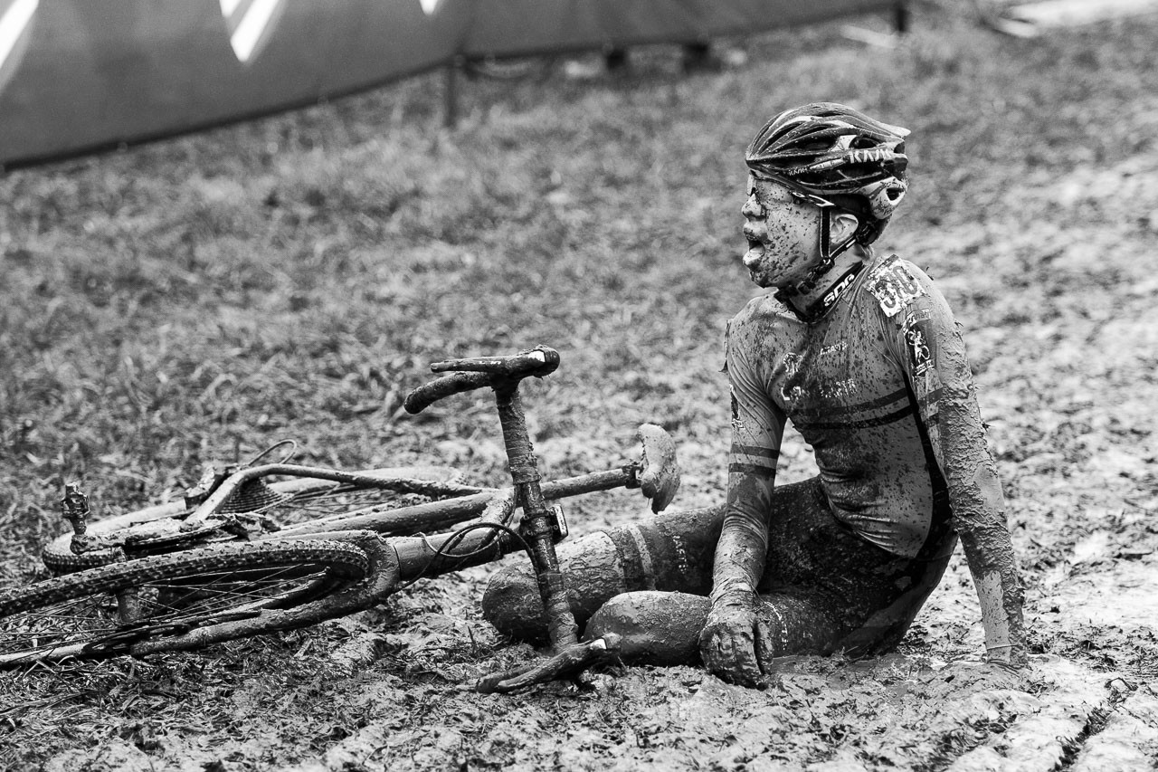 Nicholas Petrov collapsed in the mud after a 7th place finish. Junior Men 15-16. 2018 Cyclocross National Championships, Louisville, KY. © A. Yee / Cyclocross Magazine