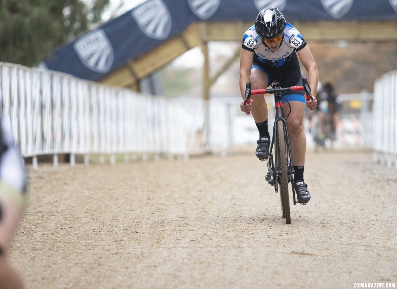 Arensman goes under the flyover as the chase organizes behind her. Collegiate Varsity Women. 2018 Cyclocross National Championships, Louisville, KY. © A. Yee / Cyclocross Magazine