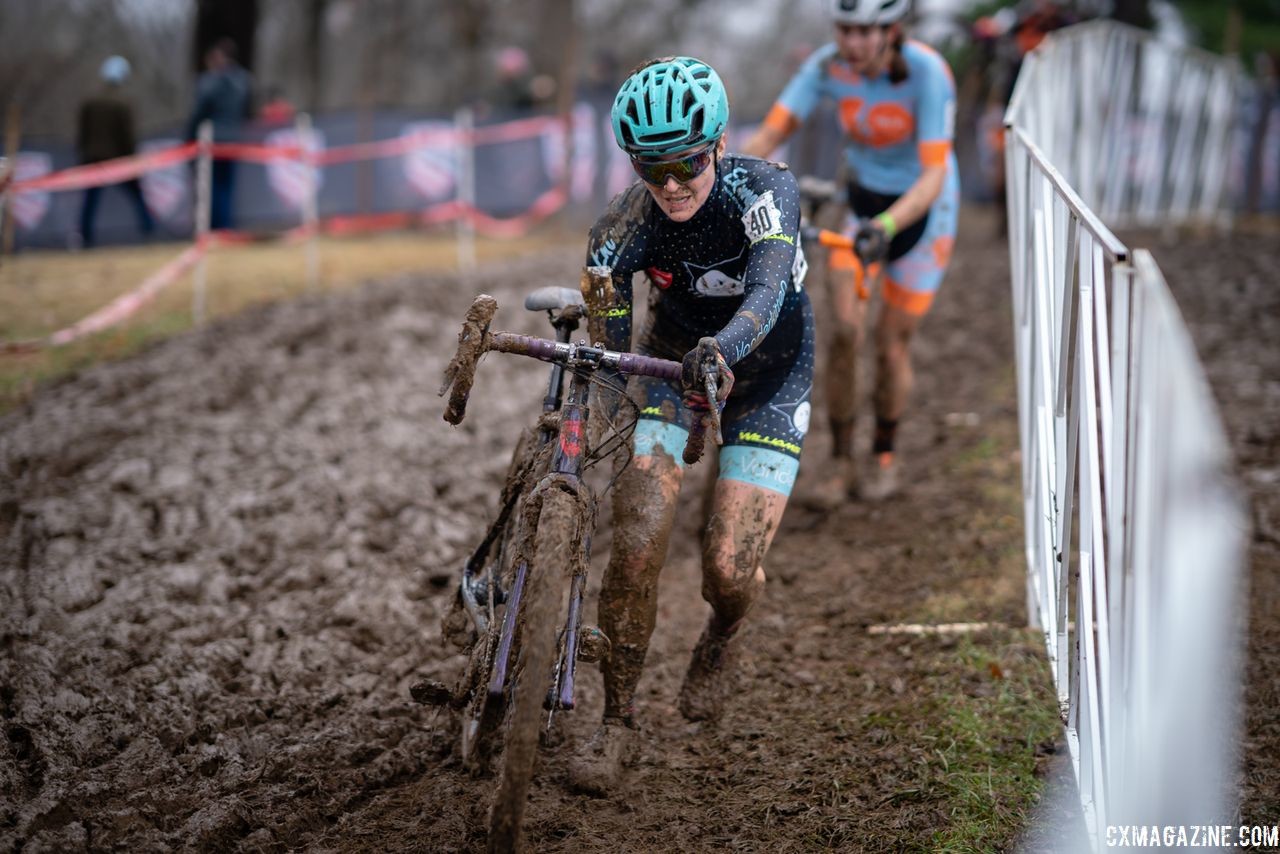 Gabriella Sterne gets set to shoulder her bike. 2018 Louisville Cyclocross Nationals, Saturday and Sunday. © Drew Coleman