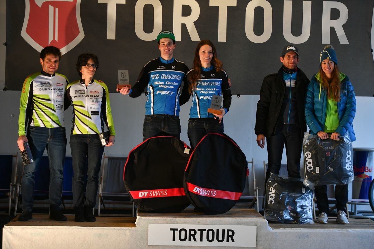 Two-person, mixed gender podium. 2019 Tortour Winter Gravel Stage Race, Switzerland. © alphafoto.com