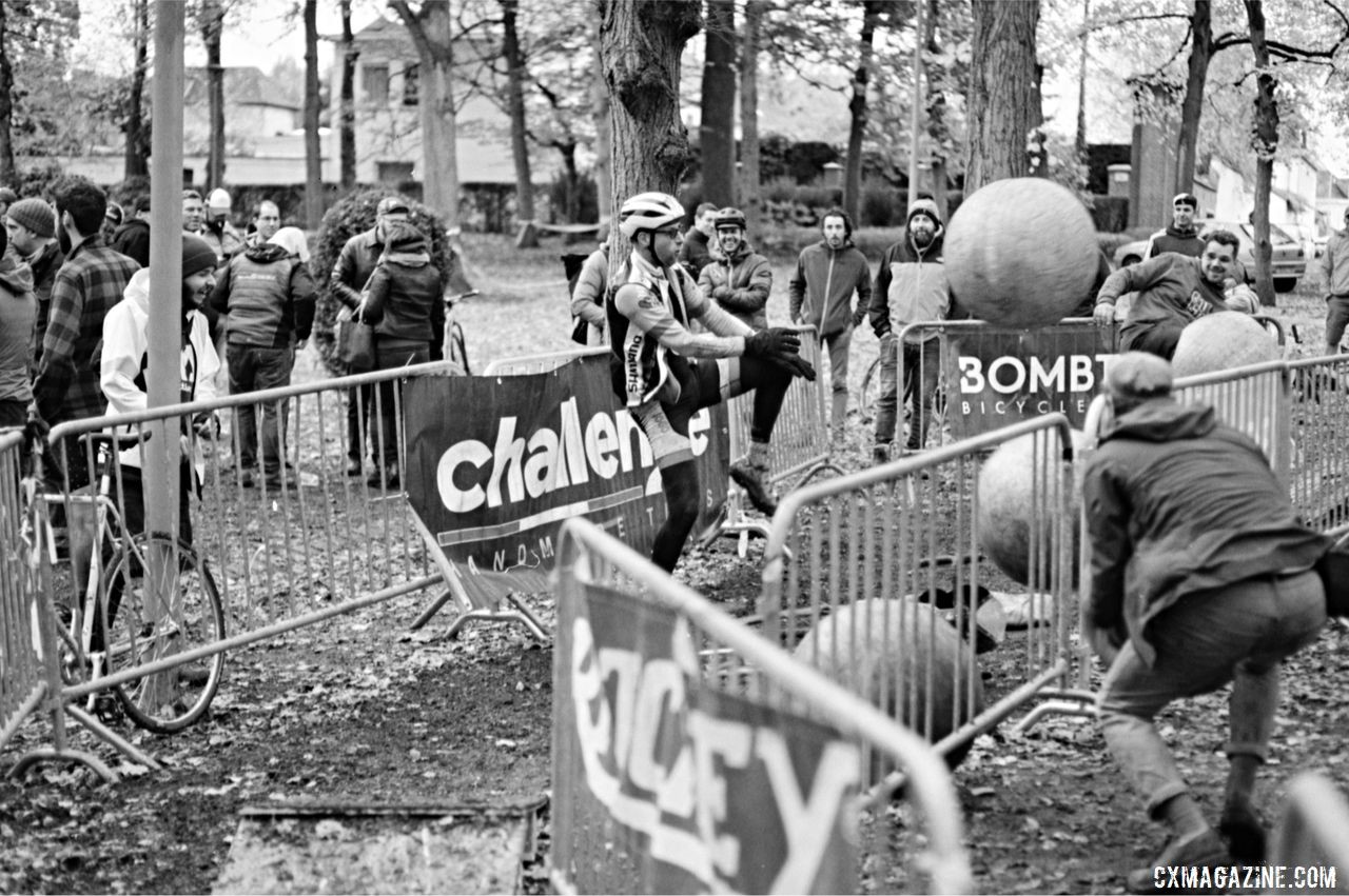 A rider stops and clears one of the balls from the course. 2018 Single Speed Cyclocross World Championships, Tournai, Belgium. © Anders Bendixen