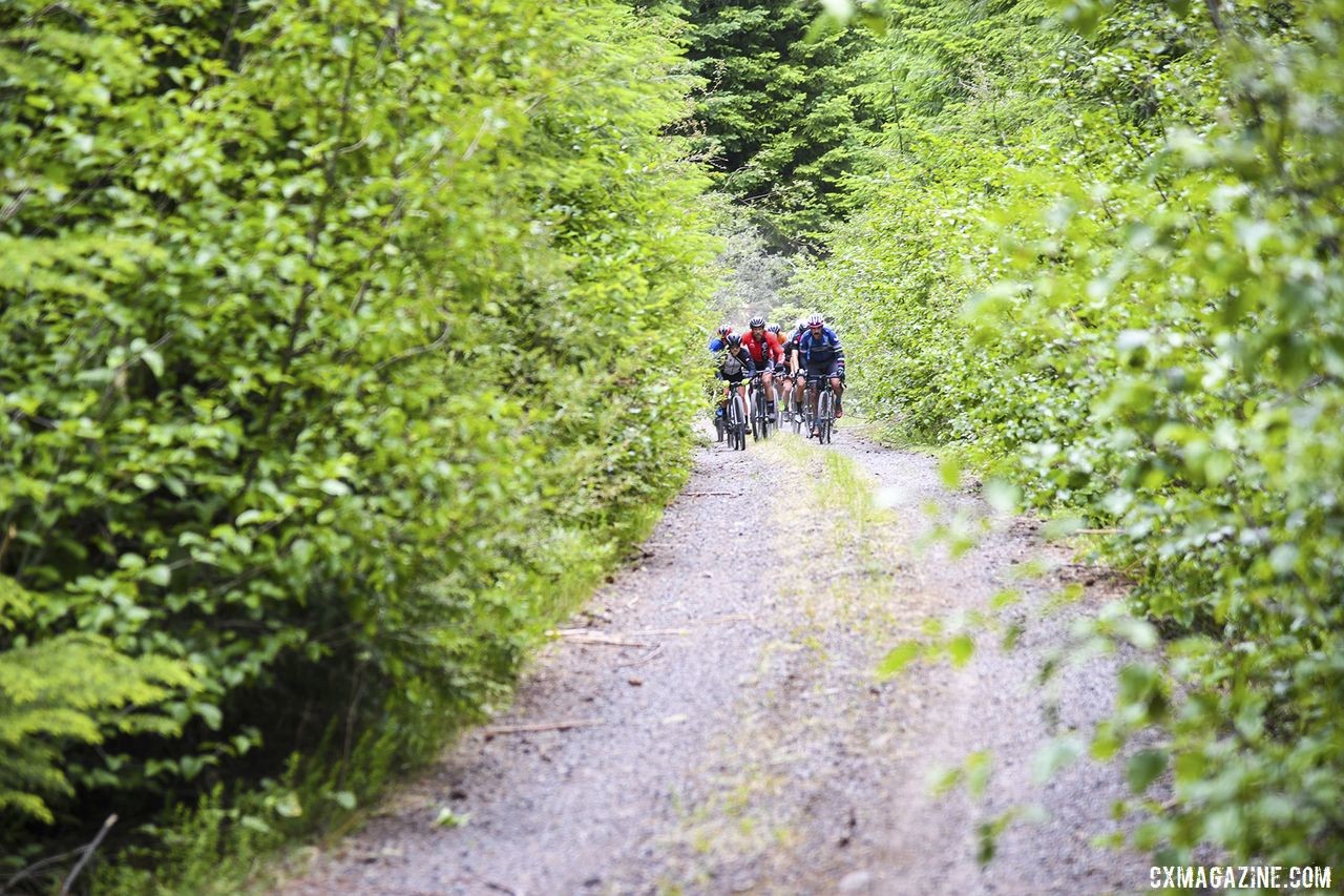 A group of riders makes its way through a narrow section. 2019 Oregon Trail Gravel Grinder. © Adam Lapierre