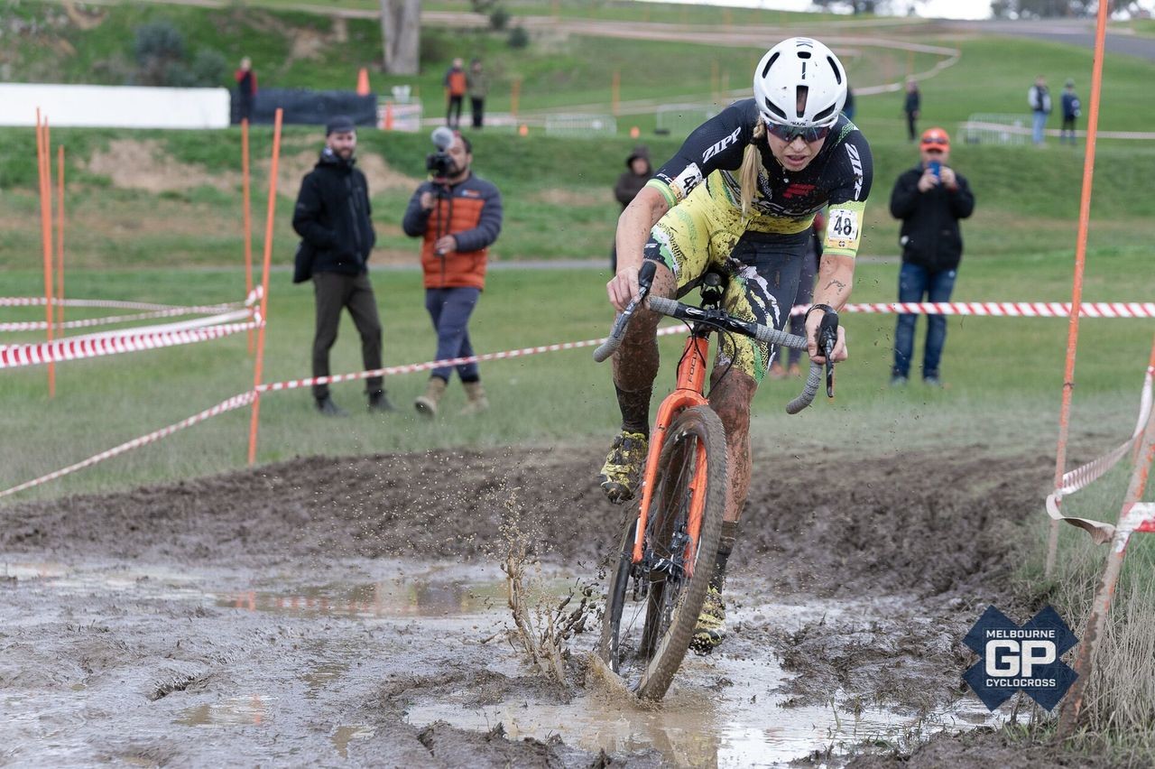 Race winner Peta Mullens splashes through one of the mud sections. 2019 MELGPCX Day 2, Melbourne, Australia. © Ernesto Arriagada