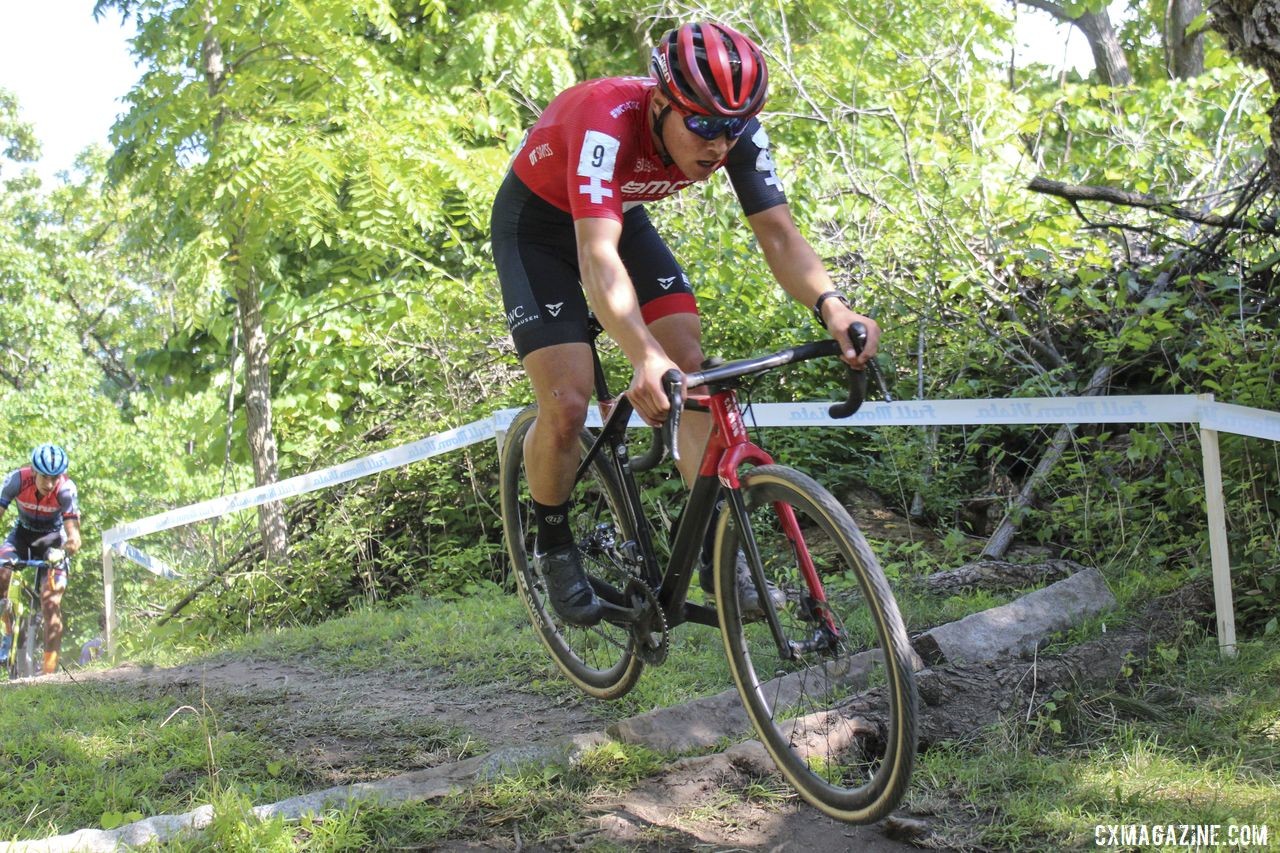 Swiss rider Timon Ruegg pops over the granite block at the exit of The Jungle. 2019 Rochester Cyclocross Day 1, Saturday. © Z. Schuster / Cyclocross Magazine