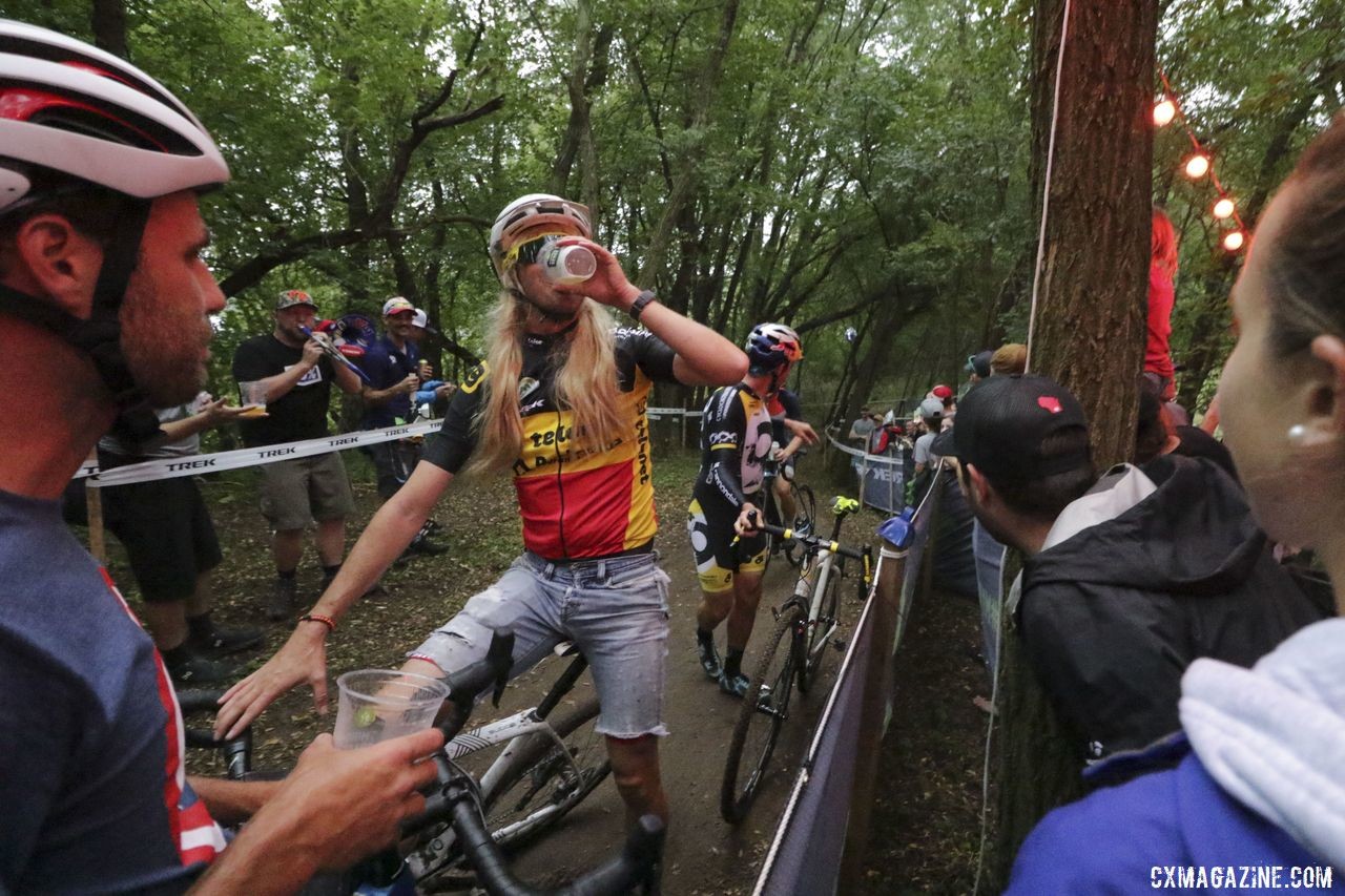 Jeans shorts Toon Aerts takes a handup near the Secret Bar. 2019 Trek CX Cup and World Cup Waterloo Scene. © D. Mable / Cyclocross Magazine