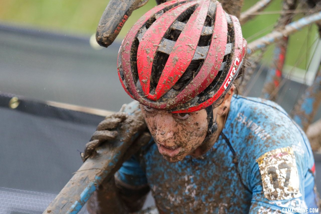 Courtenay McFadden shoulders her bike during one of the many running sections. 2019 World Cup Waterloo, Elite Women. © D. Mable / Cyclocross Magazine