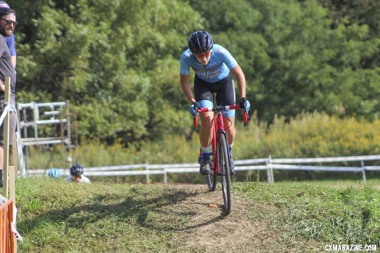 A CXHairs Devo rider pops over a steep rise course feature. 2019 Helen100 Junior Women's Race, Trek CX Cup. © Z. Schuster / Cyclocross Magazine