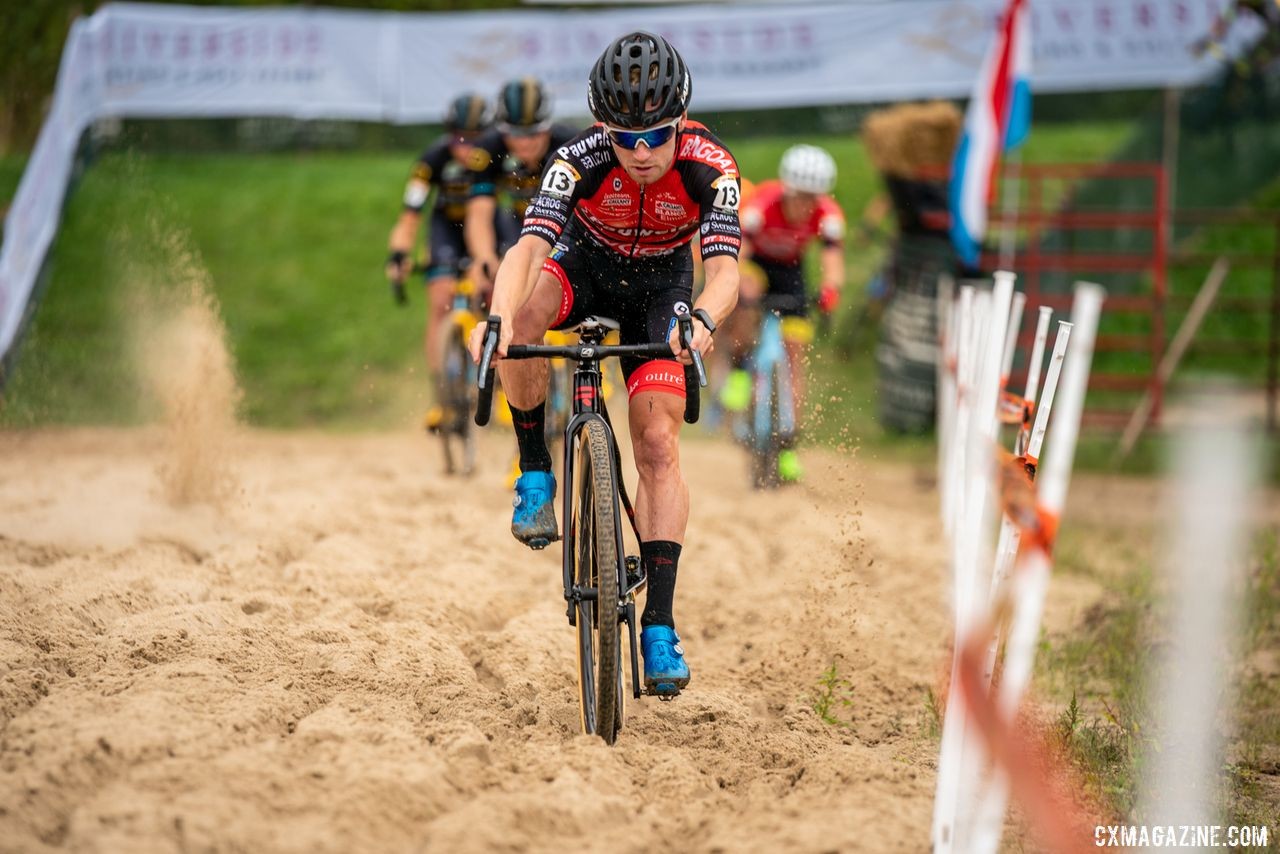 Eli Iserbyt leads through the sand en route to his World Cup win. 2019 Jingle Cross Weekend. © Drew Coleman