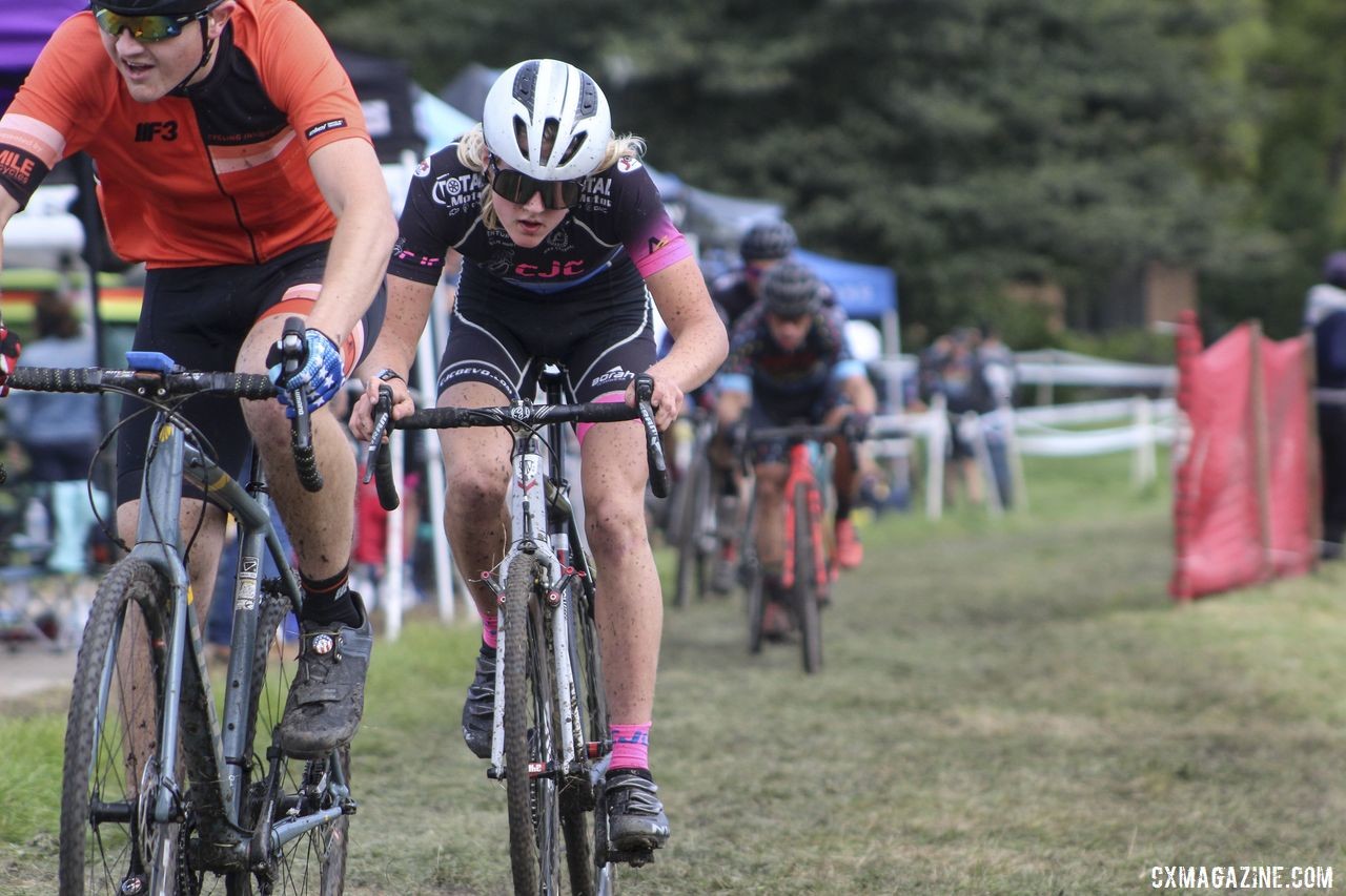 Riders speed past the pit at the end of Lap 1. 2019 CCC Hopkins Park CX at Indian Lakes. © Z. Schuster / Cyclocross Magazine