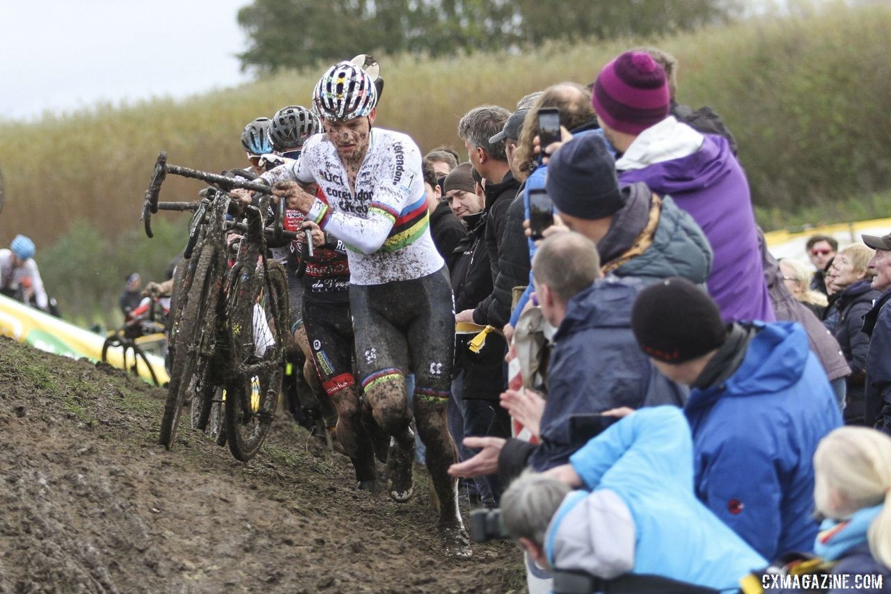 Fans get up close and personal as the Elite Men run one of the off-cambers. 2019 Superprestige Ruddervoorde. © B. Hazen / Cyclocross Magazine