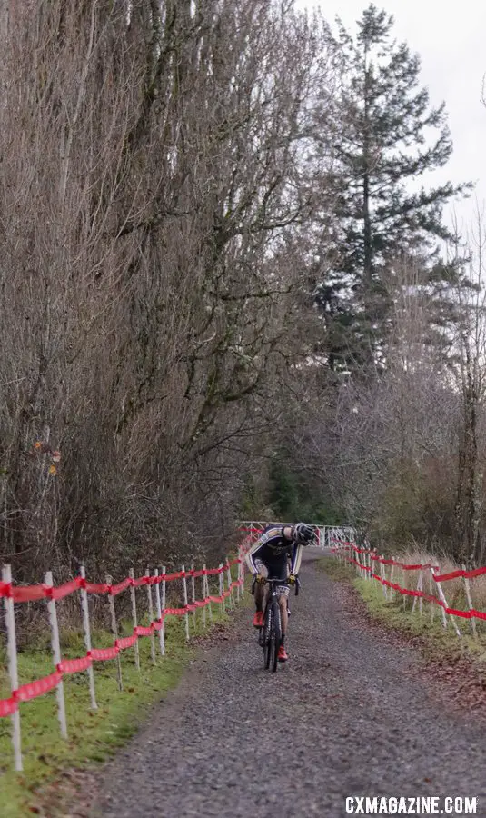 Jack Tanner checks to see who's behind him as he climbs to the top of the Fort Steilacoom Park course. Collegiate Club Men. 2019 Cyclocross National Championships, Lakewood, WA. © D. Mable / Cyclocross Magazine