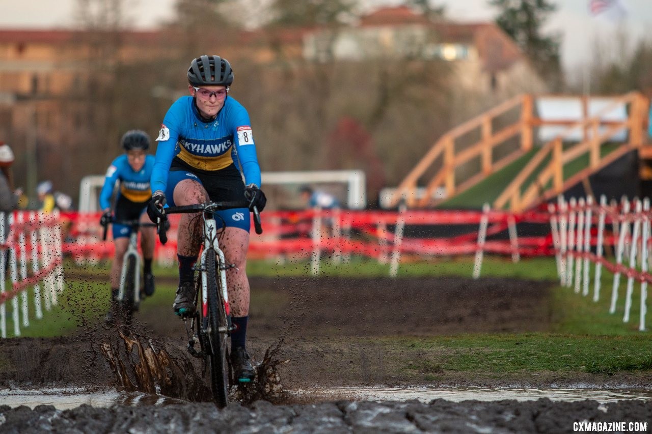 Tristen Musselman splashes through a deep puddle during the first friday morning race. Collegiate Varsity Women. 2019 Cyclocross National Championships, Lakewood, WA. © A. Yee / Cyclocross Magazine