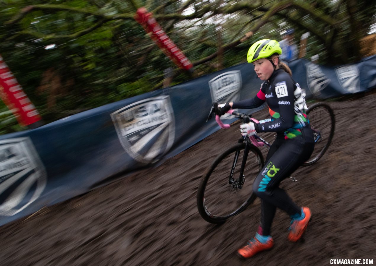 Local rider Kassidy McNees runs down the steep Disco-drop descent. Junior Women 11-12. 2019 Cyclocross National Championships, Lakewood, WA. © A. Yee / Cyclocross Magazine