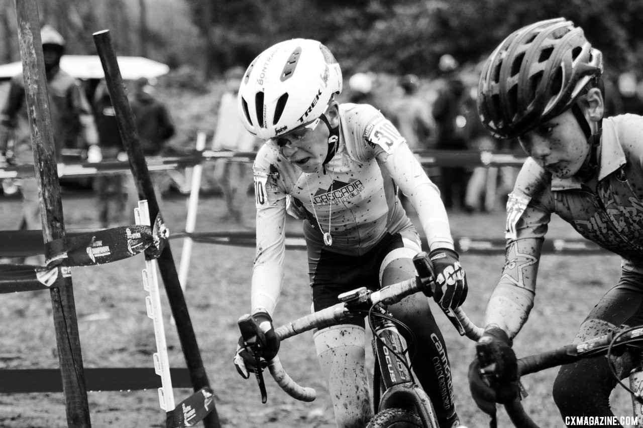 Bjorn Blankenship and Isaiah Culbreath battle for position as the come out of a tight corner. Junior Men 11-12. 2019 Cyclocross National Championships, Lakewood, WA. © D. Mable / Cyclocross Magazine