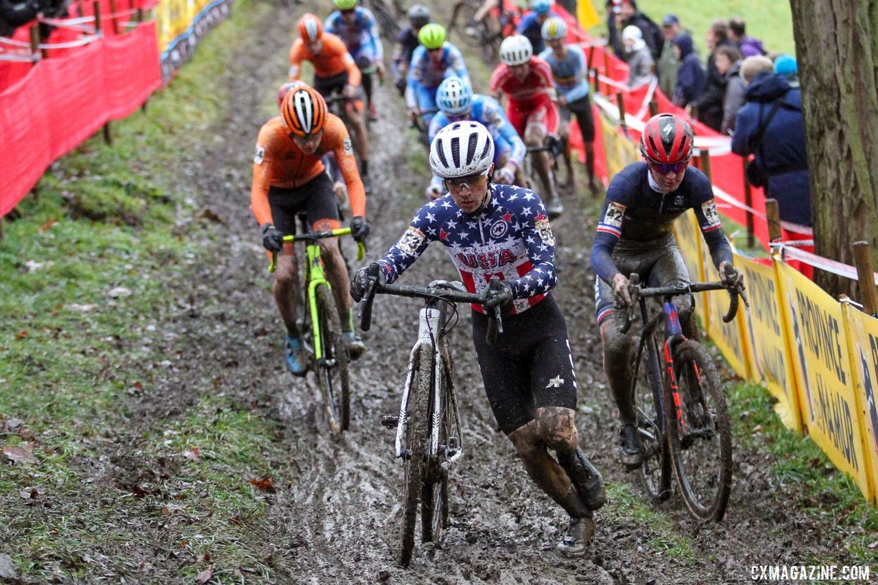Andrew Strohmeyer dismounts following the iconic off-camber section. Junior Men, 2019 Namur UCI Cyclocross World Cup. © B. Hazen / Cyclocross Magazine