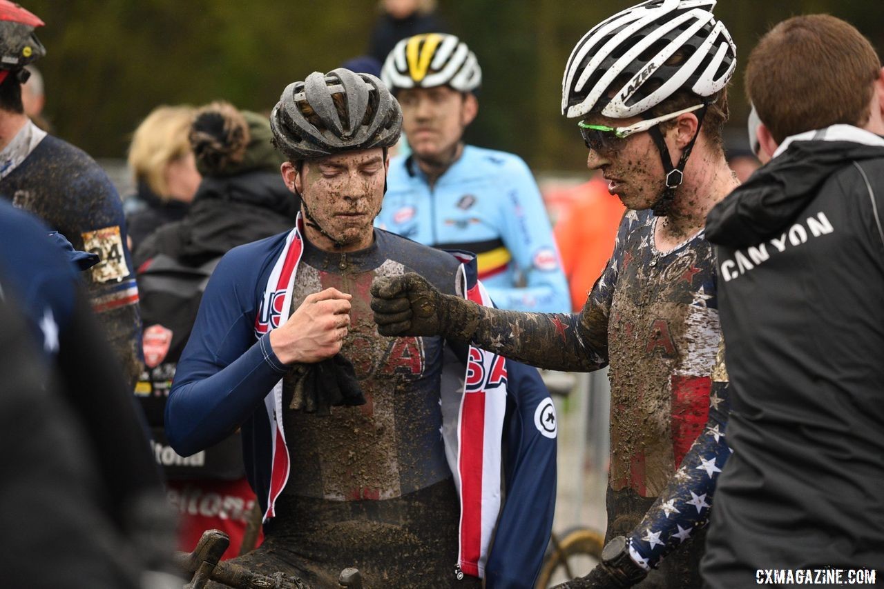 U.S. riders share a fist bump after surviving their respective races. U23 Men, 2019 Namur UCI Cyclocross World Cup. © B. Hazen / Cyclocross Magazine